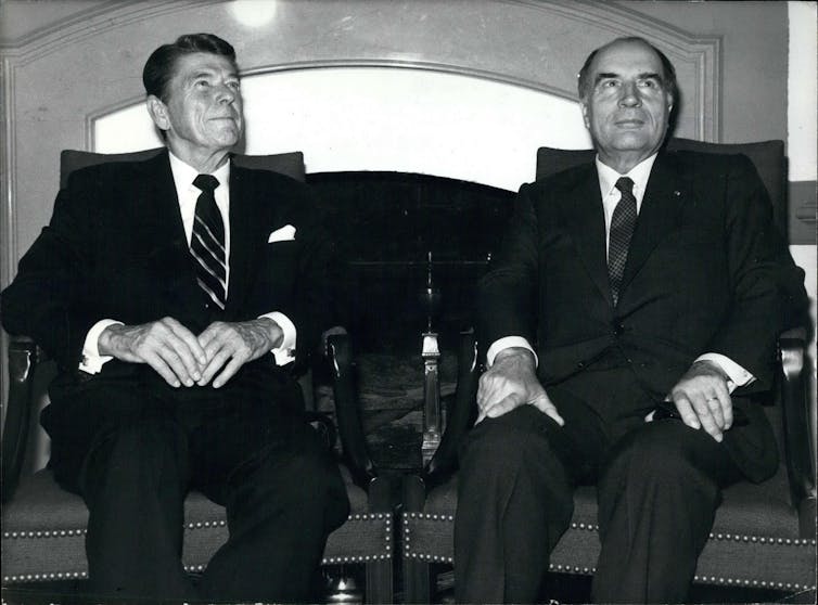 Ronald Reagan sitting with French President Francois Mitterand in 1982.